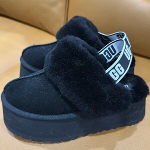 Like brand new, UGG platform slippers.  Black, Size 6